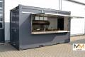 Catering container, portable kitchen, mobile kitchen