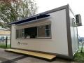 Catering container, portable kitchen, mobile kitchen