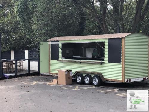 Mobile catering trailer with wood fired pizza oven